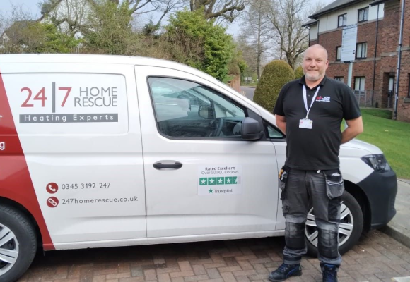 24|7 home rescue gas safe engineer standing front with the 24|7 van